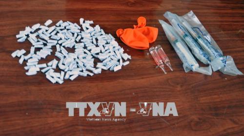 Bắt giữ 2 đối tượng vận chuyển ma túy sang biên giới ảnh 2